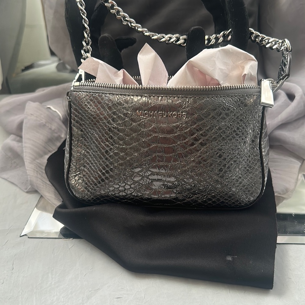 Michael Kors Silver tote.. perfect for upcoming holiday parties